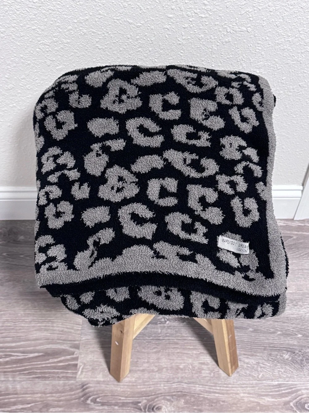 Barefoot Dreams CozyChic Barefoot in the Wild Throw Blanket in Charcoal Leopard